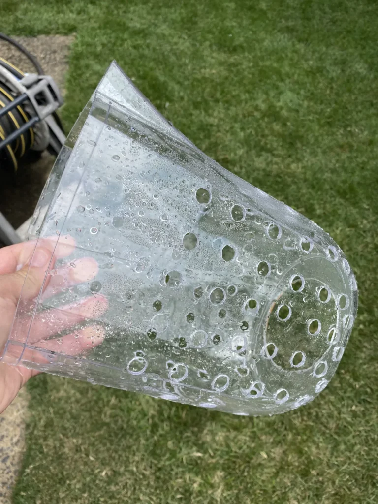 Perforated media guard used around an aquaponics bell siphon standpipe