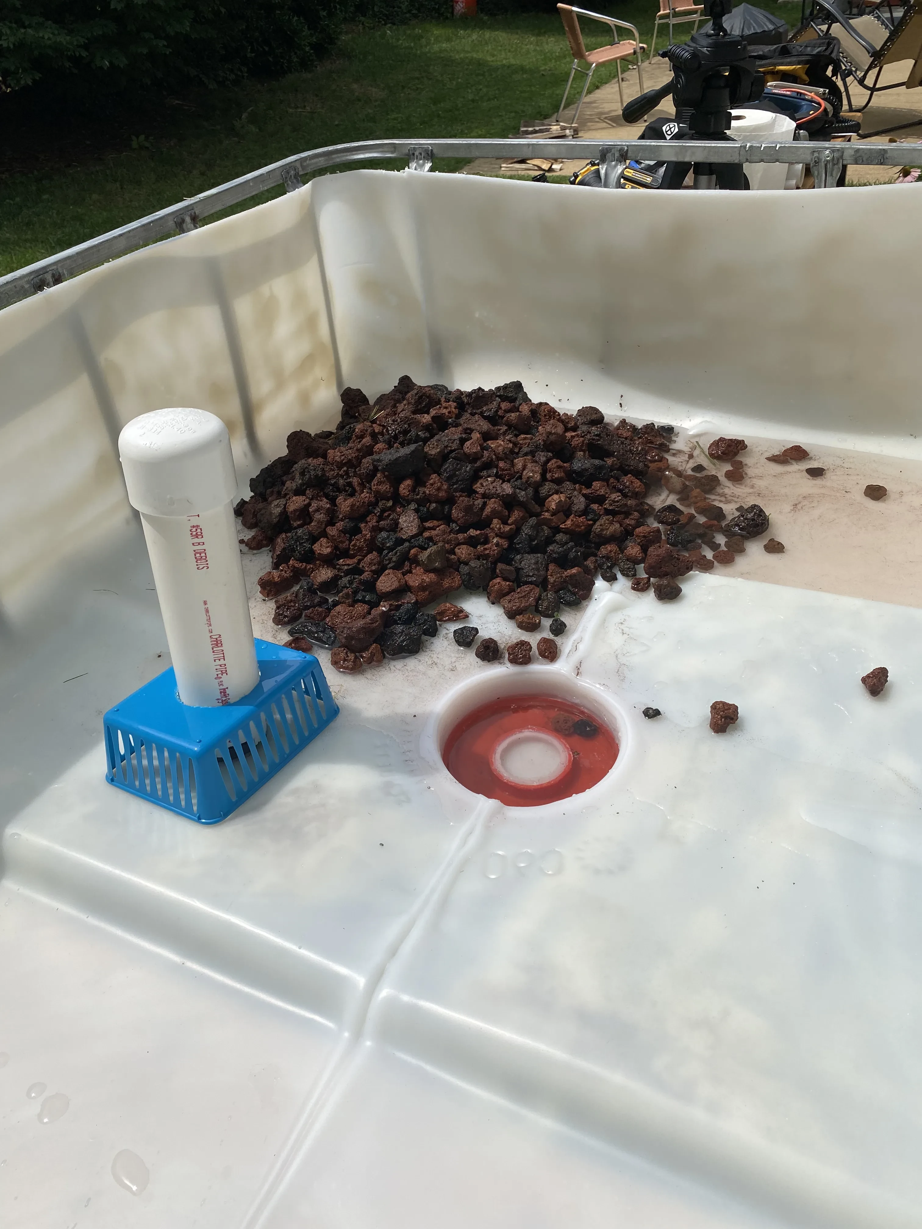 Aquaponics grow bed standpipe and drain area before media installation